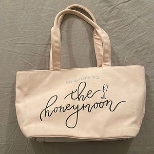 Pink Kate Spade purse with wedding/honeymoon detail